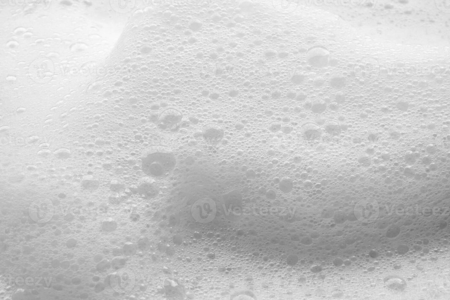 Abstract white soap foam bubbles texture background photo