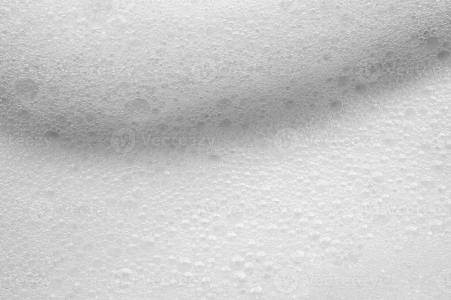 Abstract white soap foam bubbles texture background photo