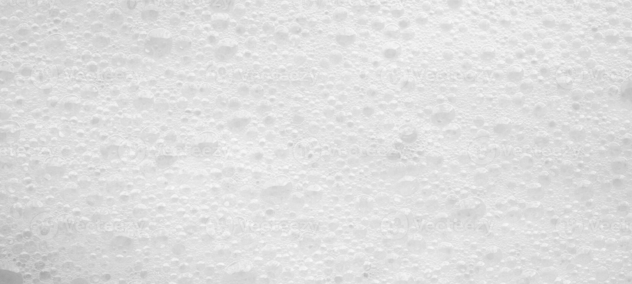 Abstract white soap foam bubbles texture background photo