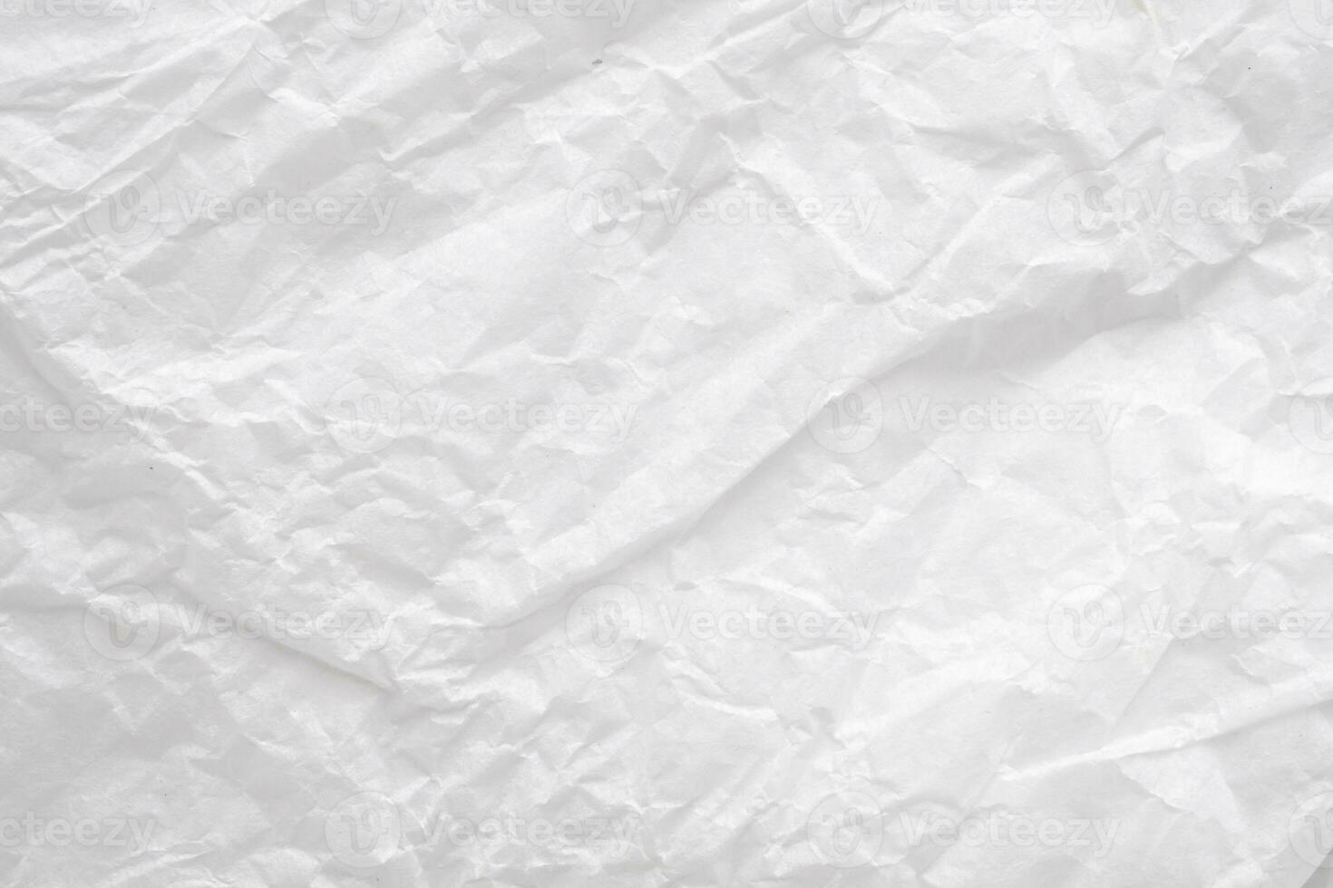 Abstract white crumpled and creased recycle paper texture background photo