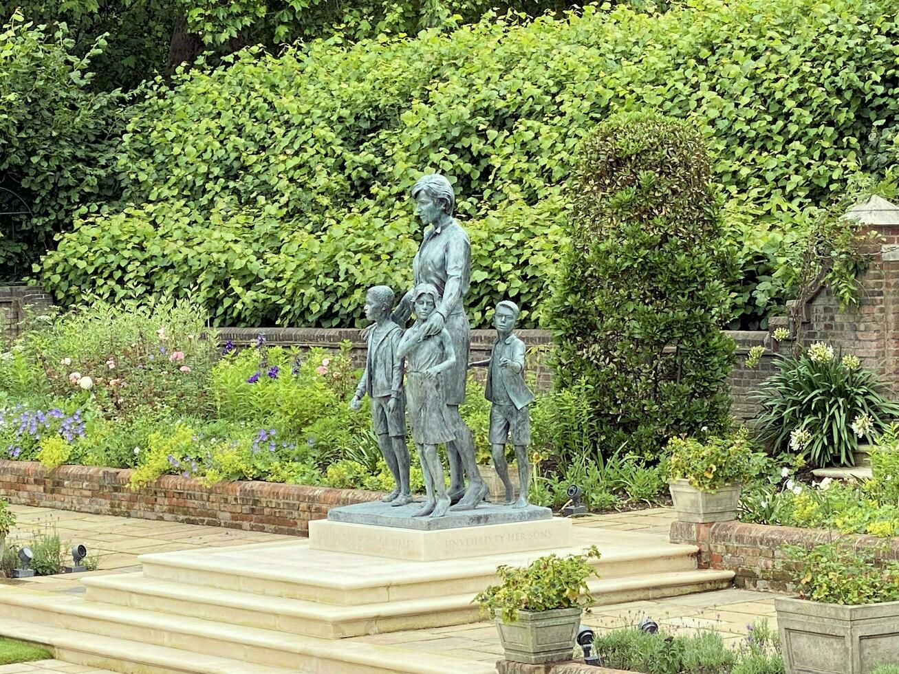 London in the UK on 10 July 2021. A view of Kensington Palace Gardens showing the statue of Diana photo