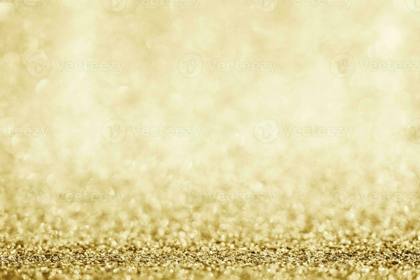 Abstract gold glitter sparkle blurred with bokeh background photo
