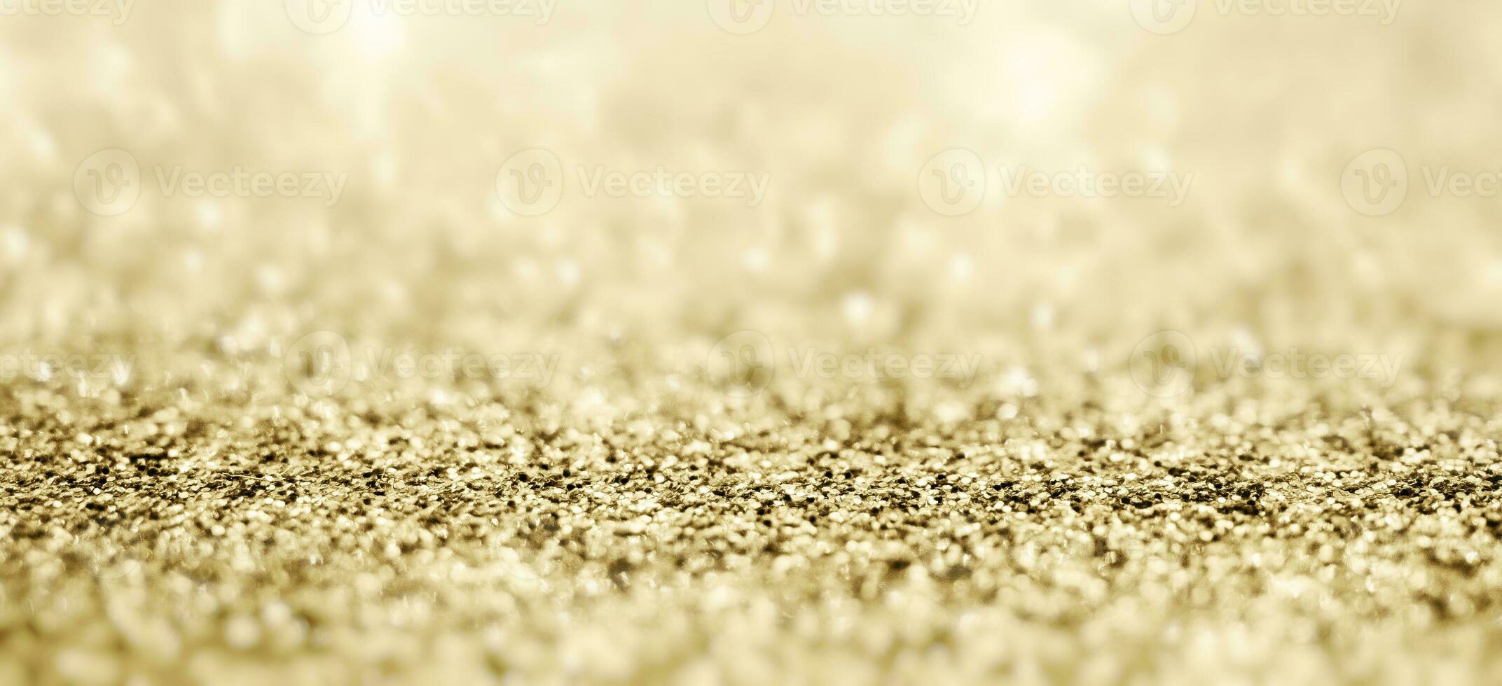 Abstract gold glitter sparkle with bokeh background photo