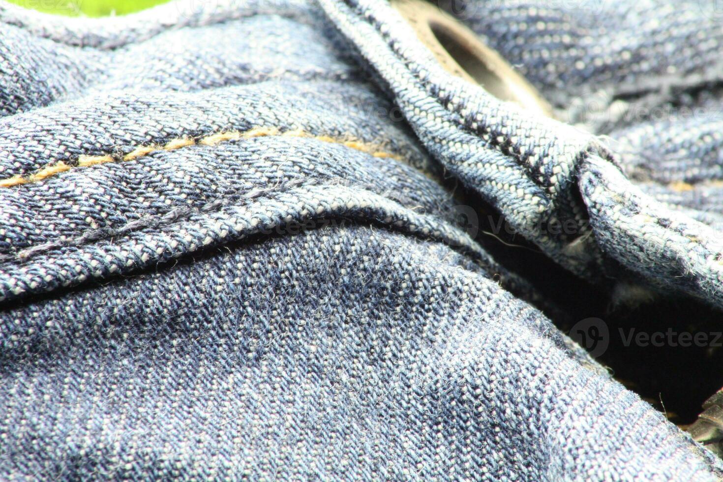 Close-up of blue jeans and denim details. photo