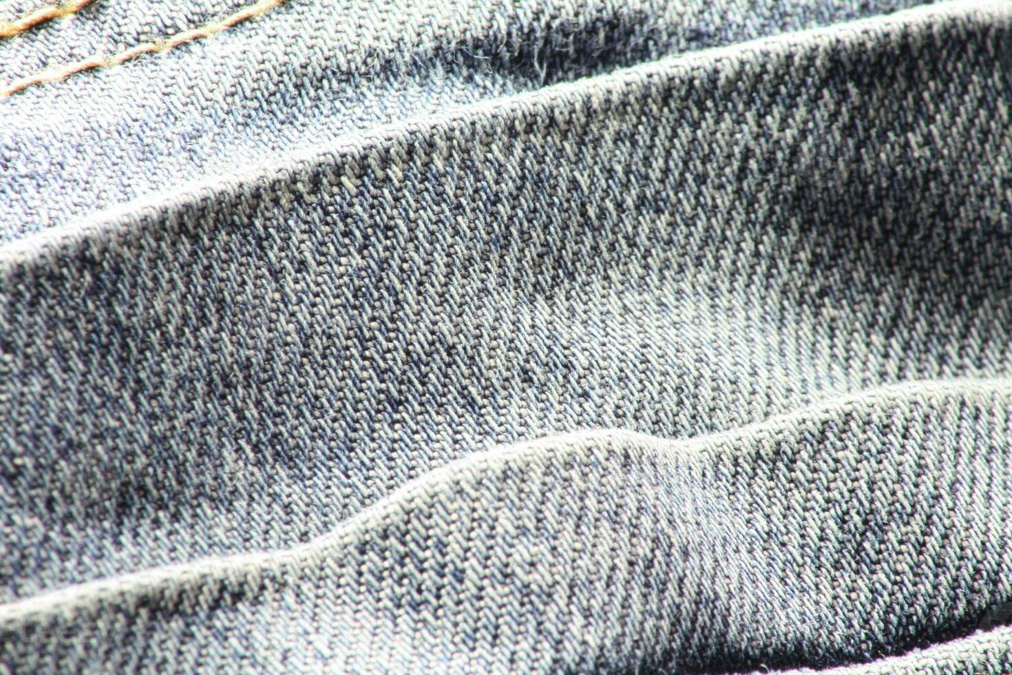 Close-up of blue jeans and denim details. photo