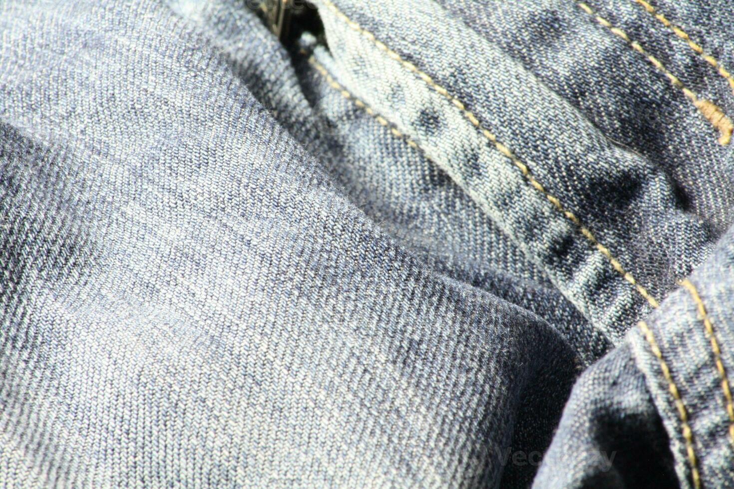 Close-up of blue jeans and denim details. photo