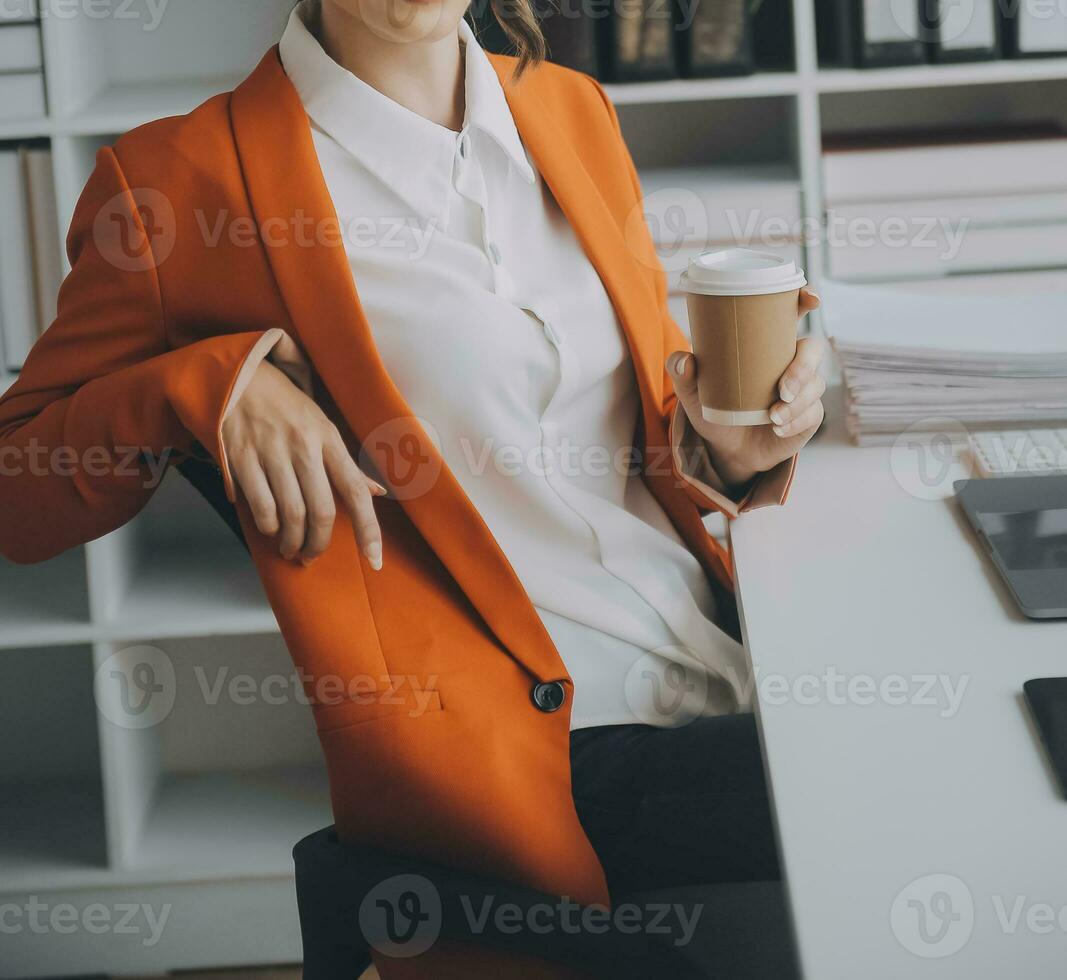 Audit concept,Administrator business man financial inspector and secretary making report calculating balance. Internal Revenue Service checking document. photo
