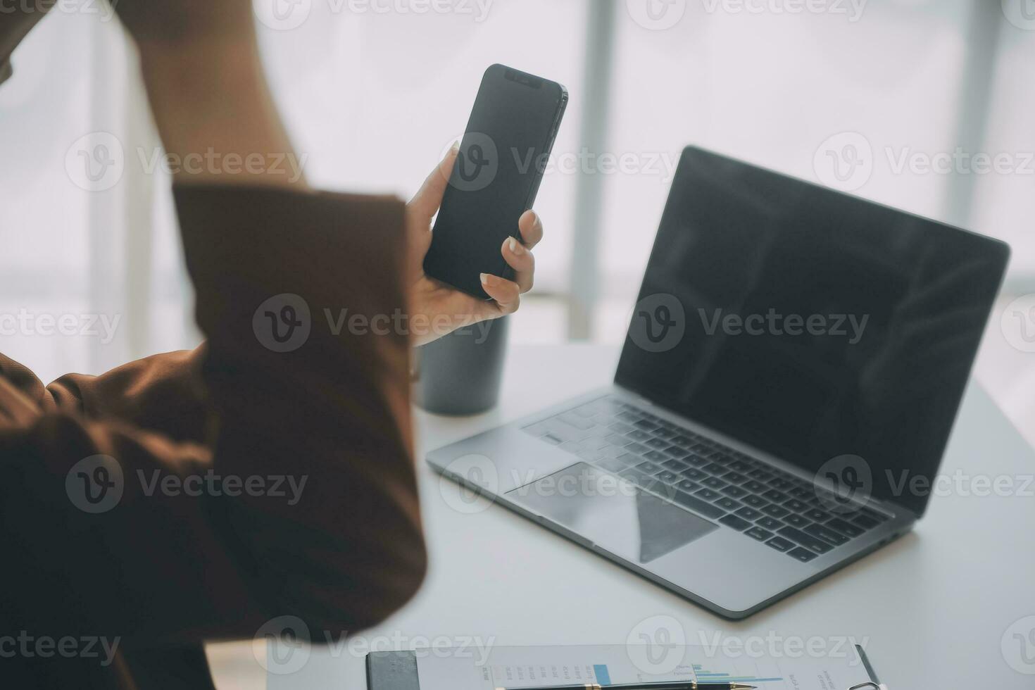 Audit concept,Administrator business man financial inspector and secretary making report calculating balance. Internal Revenue Service checking document. photo