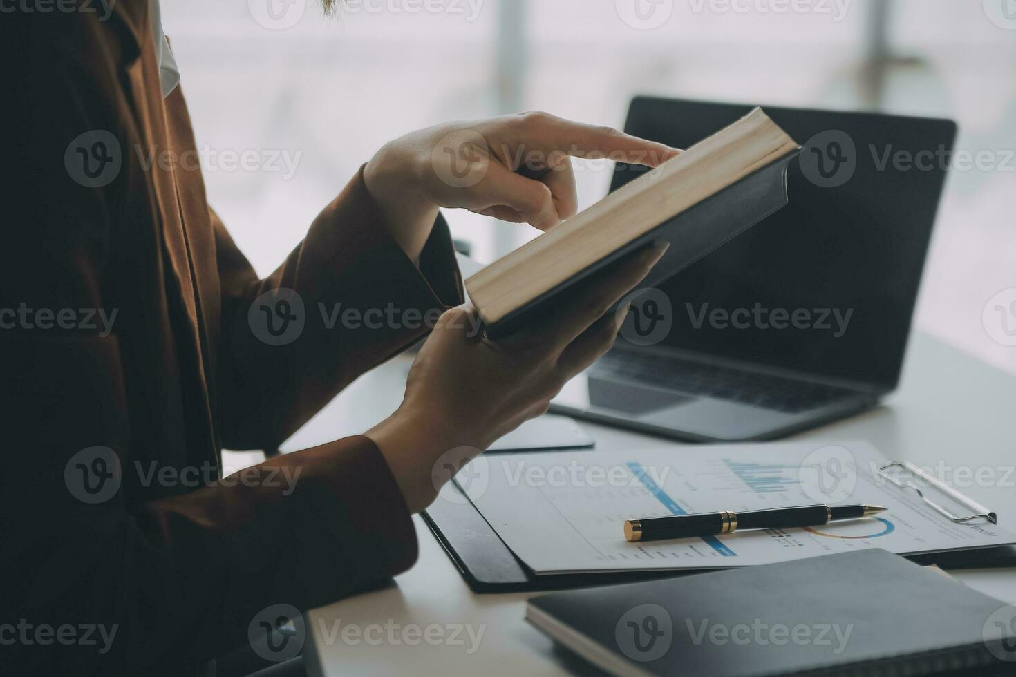 Audit concept,Administrator business man financial inspector and secretary making report calculating balance. Internal Revenue Service checking document. photo