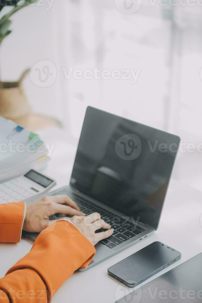 Audit concept,Administrator business man financial inspector and secretary making report calculating balance. Internal Revenue Service checking document. photo