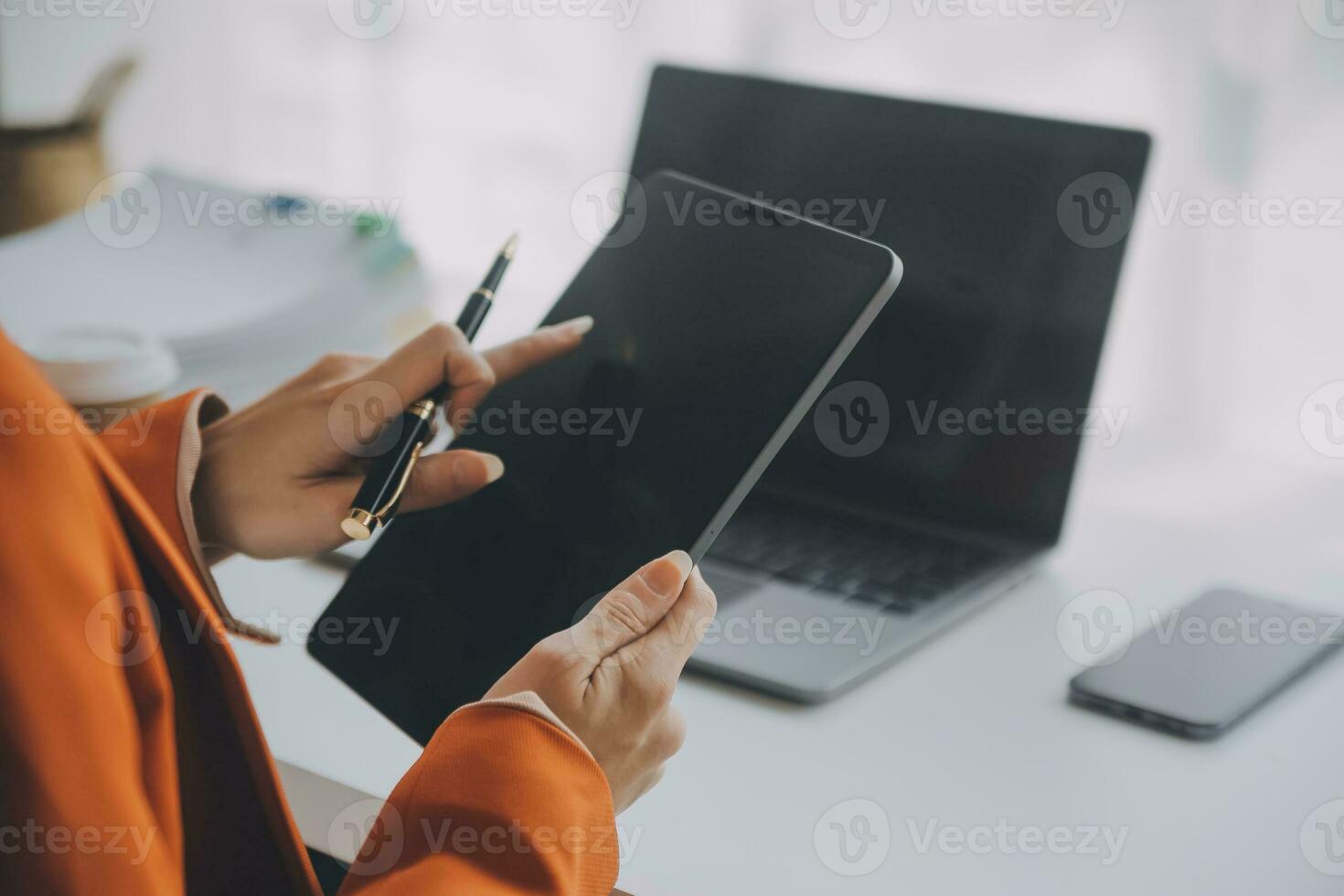 Audit concept,Administrator business man financial inspector and secretary making report calculating balance. Internal Revenue Service checking document. photo