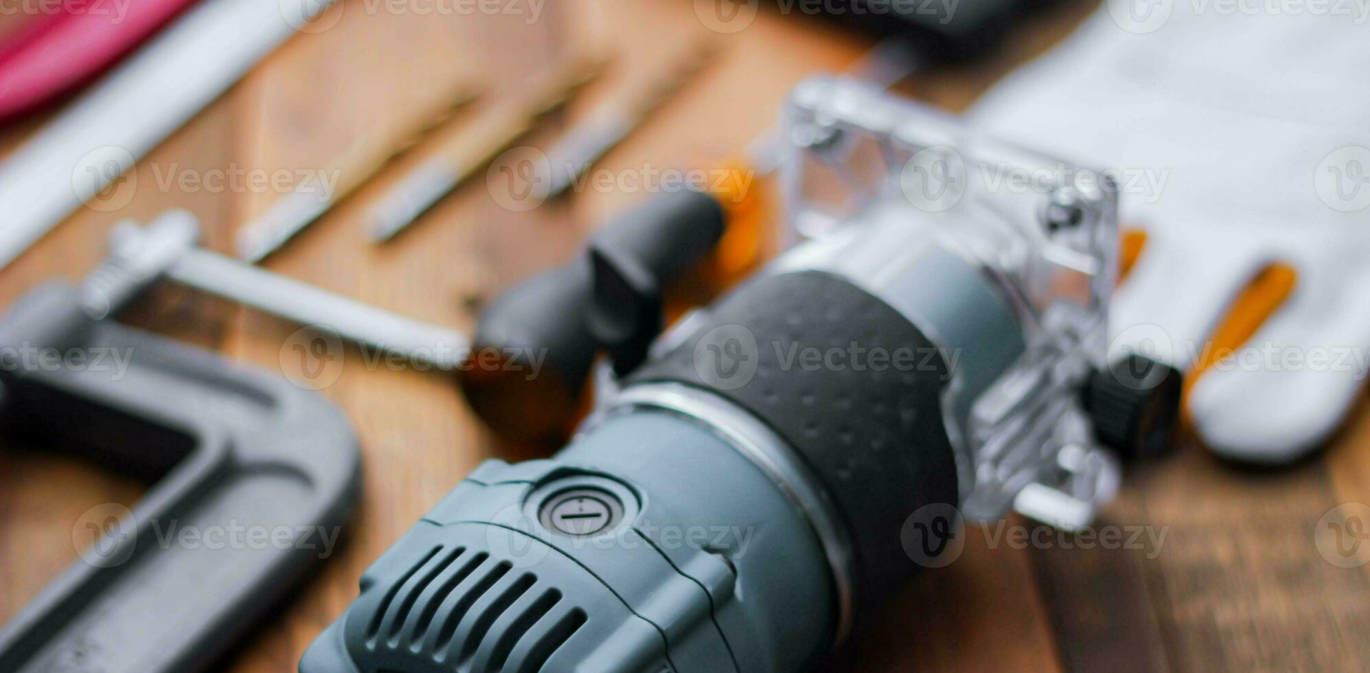 Collection of woodworking tools on a wooden background. photo