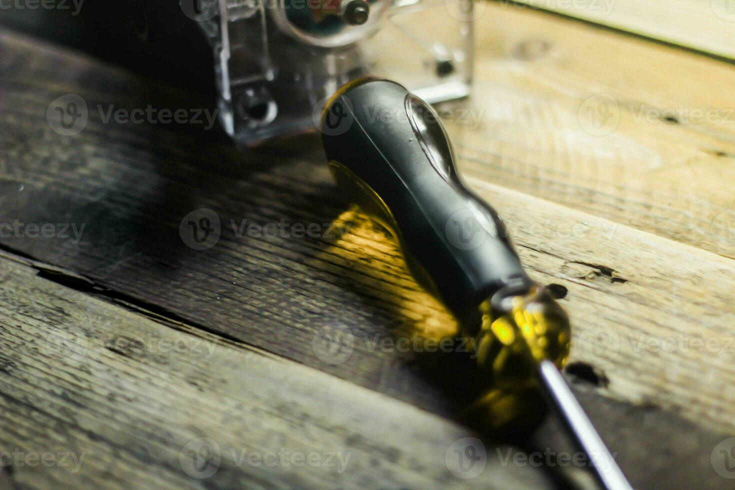 Collection of woodworking tools on a wooden background. photo