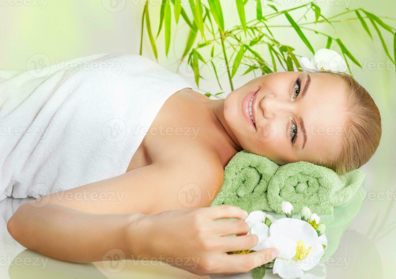 Relaxed female at spa photo