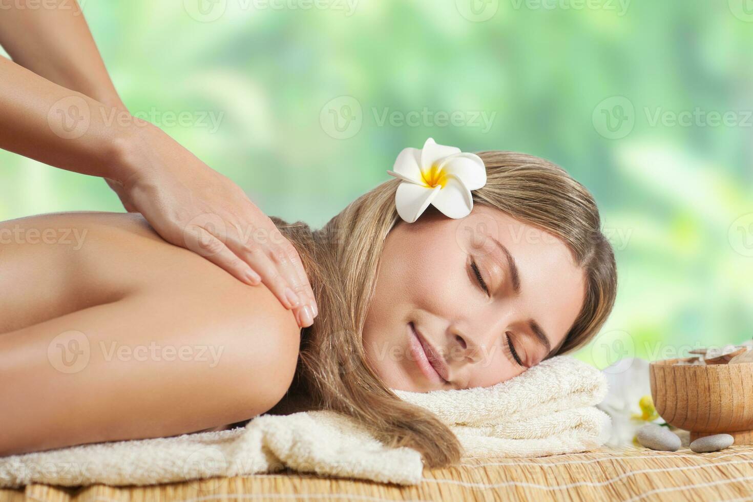 Beautiful girl enjoying spa photo