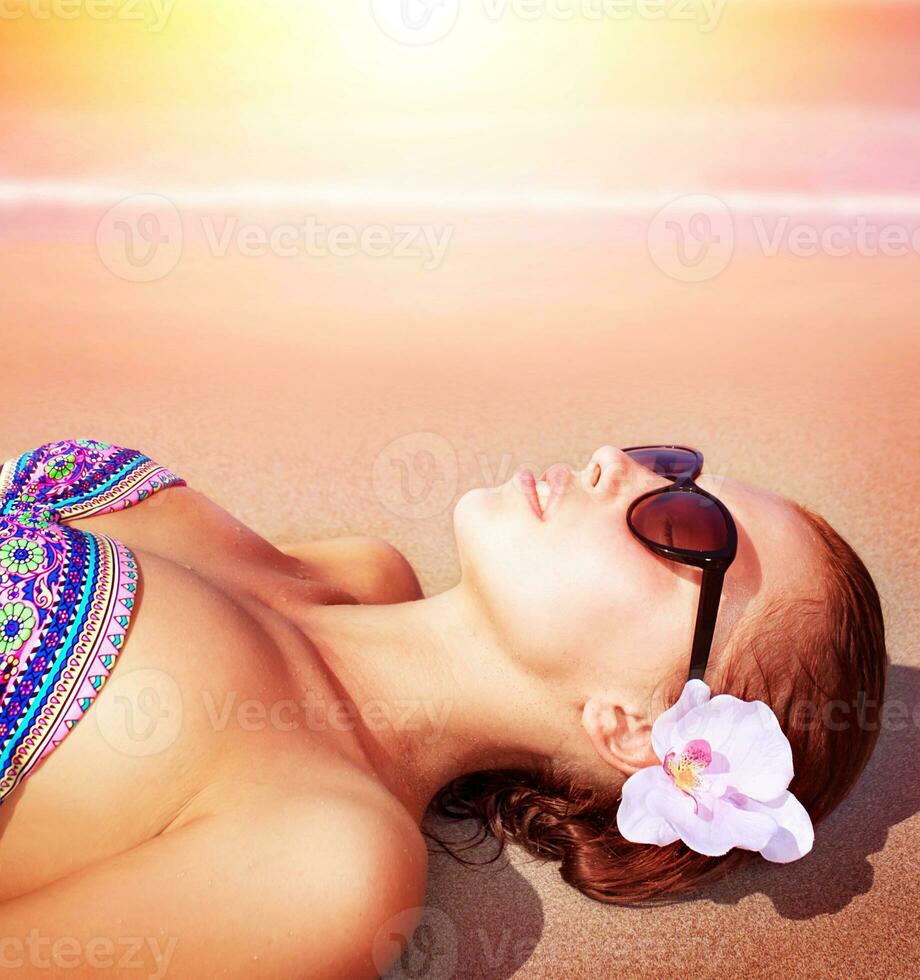 Sexy woman on the beach photo