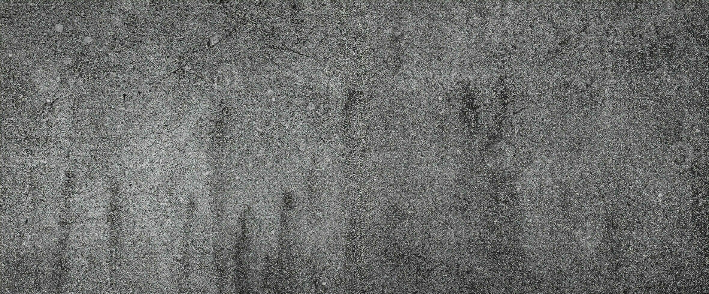 Grungy grey background of natural paintbrush stroke textured cement or stone old. concrete texture as a retro pattern wall conceptual. photo