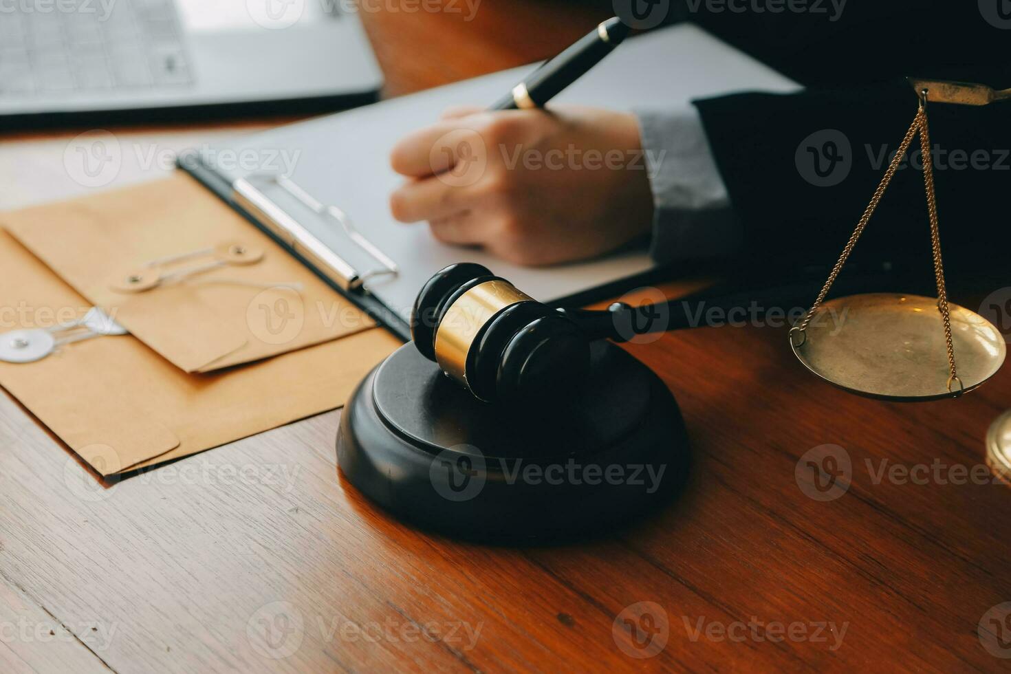 Business and lawyers discussing contract papers with brass scale on desk in office. Law, legal services, advice, justice and law concept picture with film grain effect photo