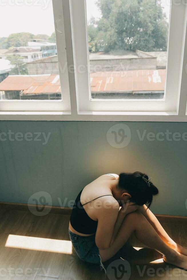 panic attacks alone young girl sad fear stressful depressed emotional.crying use hand cover face begging help.stop abusing domestic violence in women,person with health anxiety,people bad feeling down photo