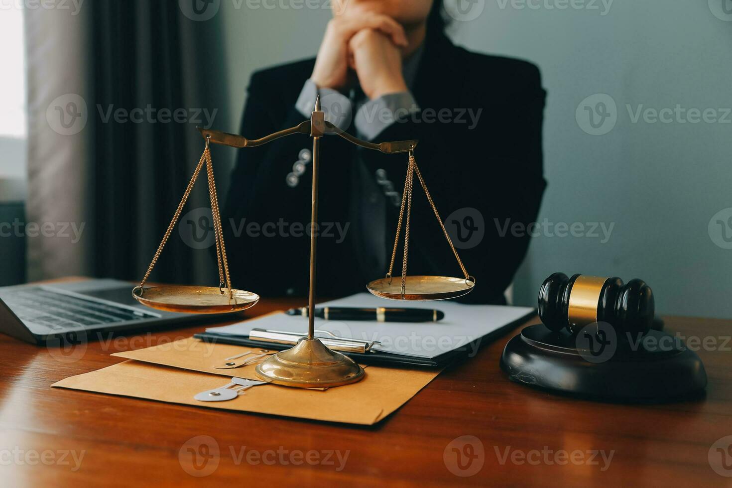 Business and lawyers discussing contract papers with brass scale on desk in office. Law, legal services, advice, justice and law concept picture with film grain effect photo