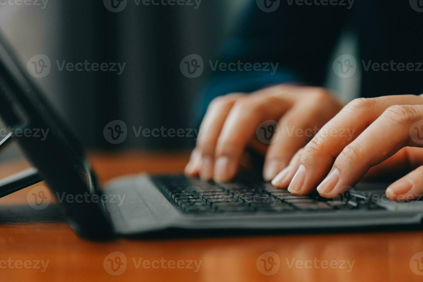 Corporate Communication. Asian Businesswoman Talking On Mobile Phone Working On Laptop In Modern Office. Free Space photo