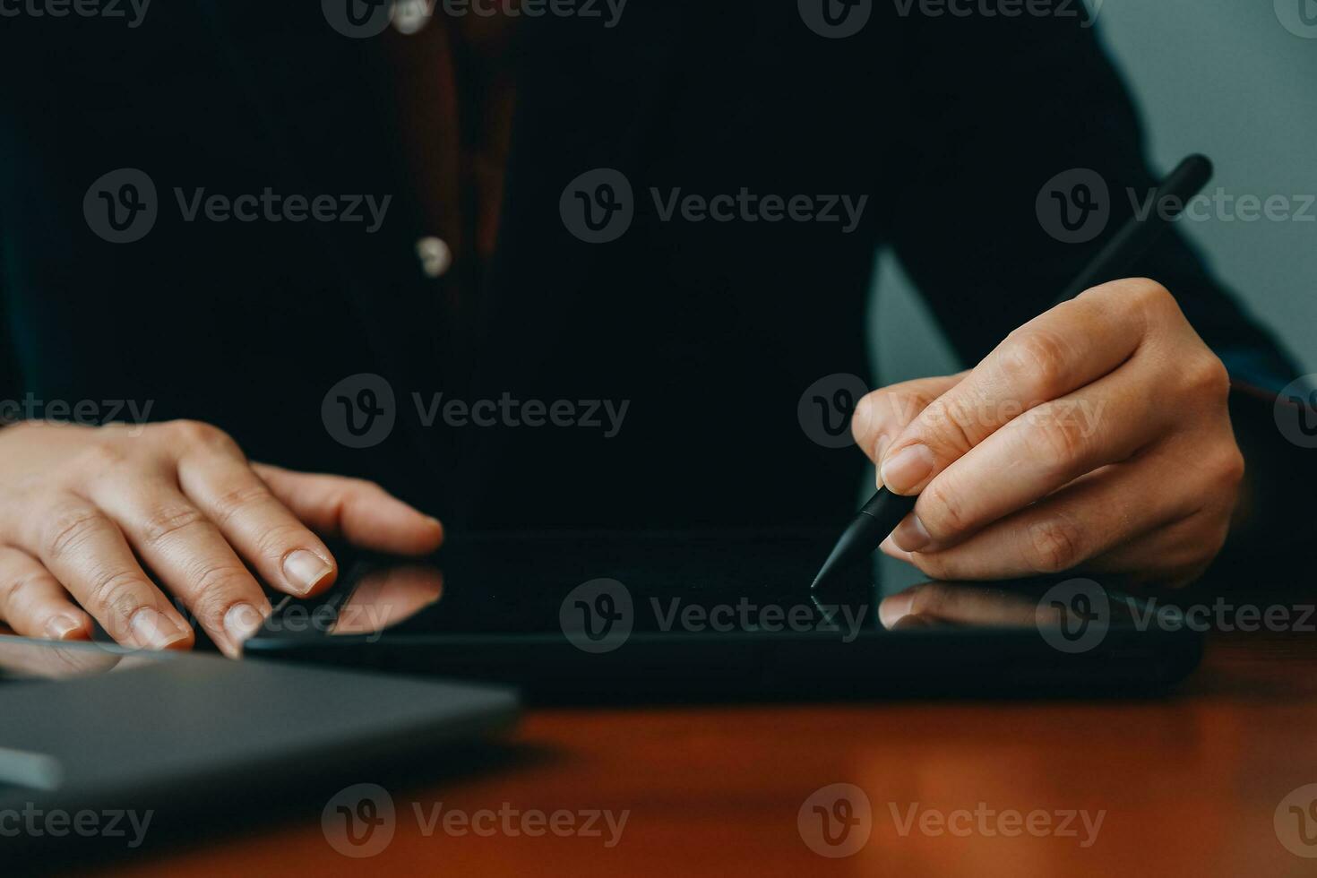 Corporate Communication. Asian Businesswoman Talking On Mobile Phone Working On Laptop In Modern Office. Free Space photo