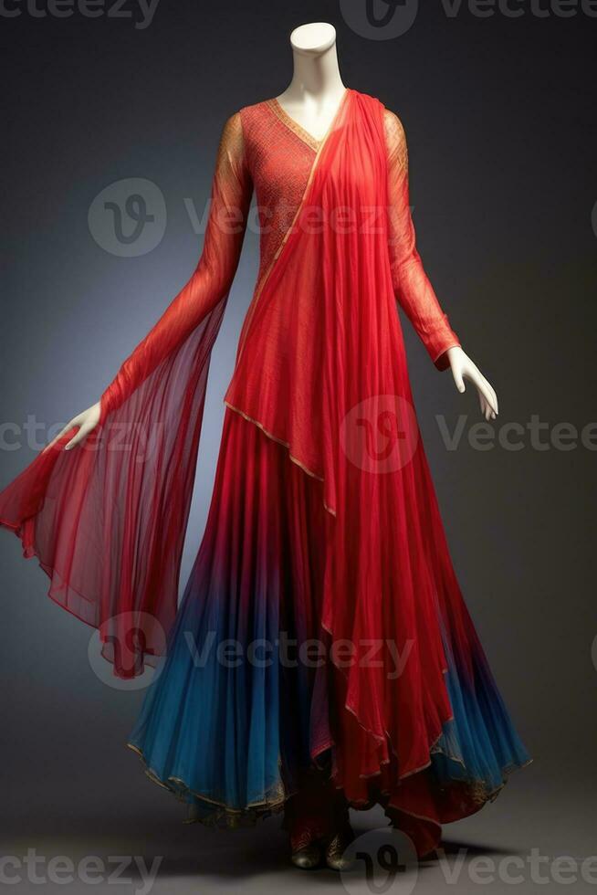 an elegant, floor-length evening dress in red, blue, and gold. photo