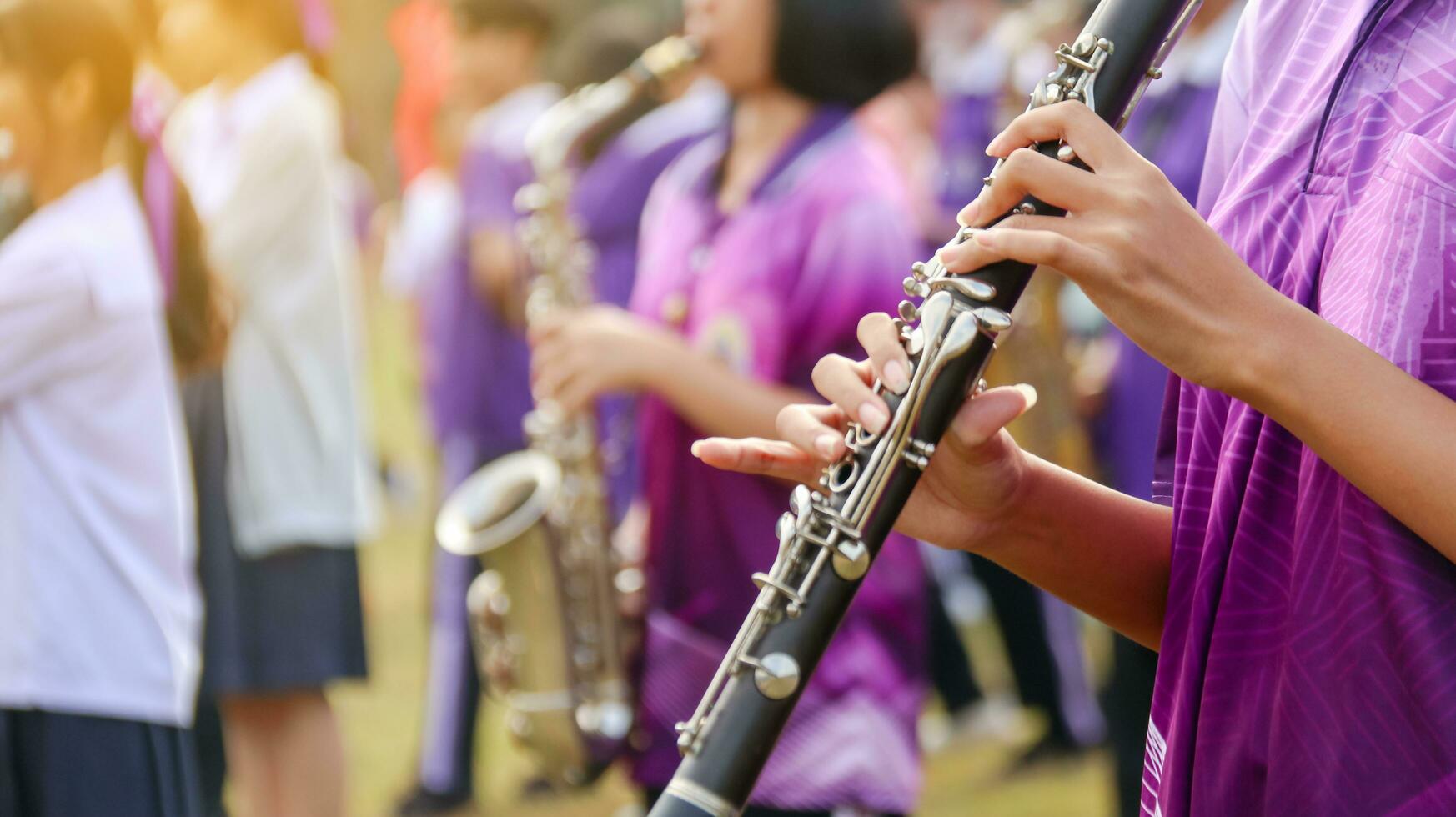 Music instrument is being played by hands photo