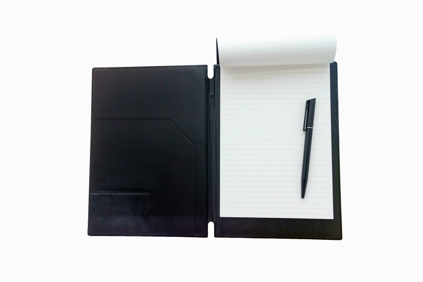 Black cover clipboard with white sheet of paper and black pen isolated on white background photo
