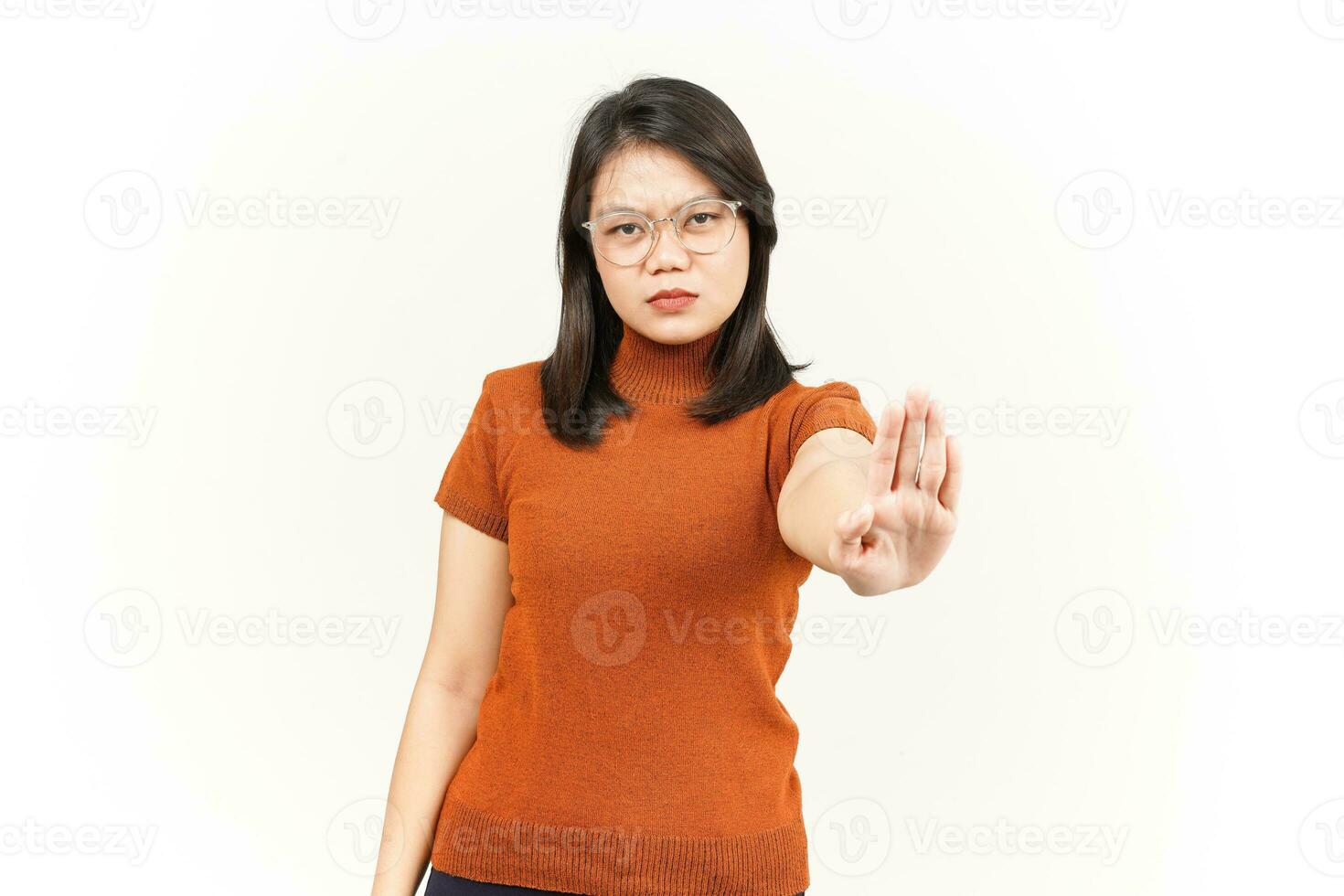 Stop and Rejection Hand Gesture Of Beautiful Asian Woman Isolated On White Background photo