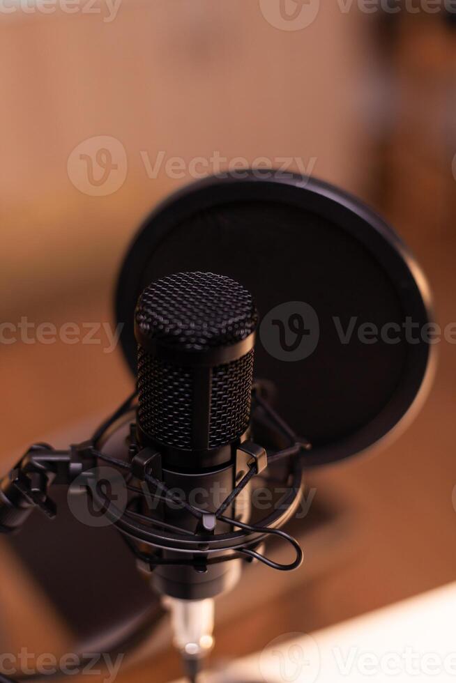 Close up of microphone at recording studio, technology and audio equipment. Recording social media content with production microphone, digital web internet streaming station photo