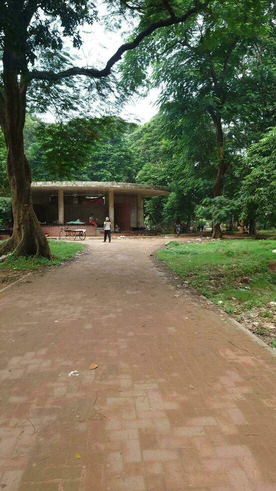 Dhaka University is located in Dhaka, Bangladesh. Aparajeyo Bangla is a sculpture commemorating the 1971 Bangladesh Liberation War. It is situated on the Dhaka University campus. photo