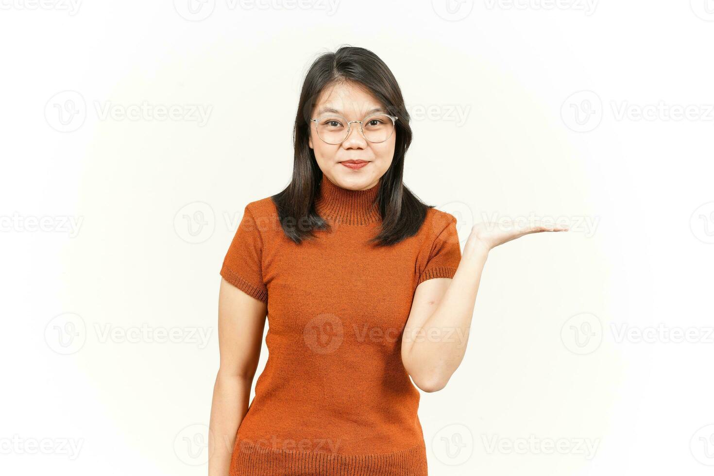 Presenting and Showing Product on Open Palm Of Beautiful Asian Woman Isolated On White Background photo