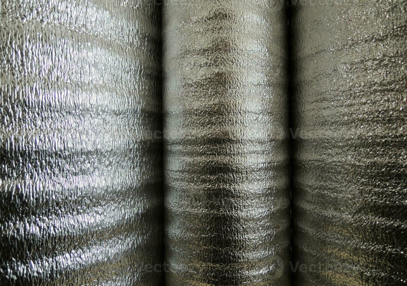 Foiled Heat Insulation Rolls Side View Texture Background photo