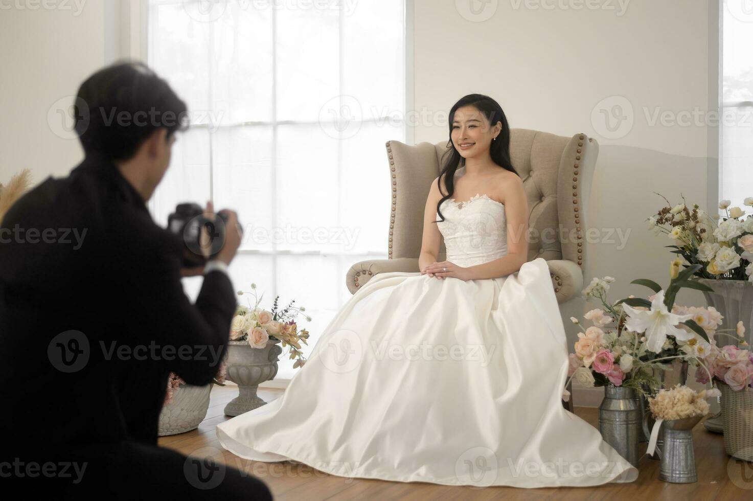 Groom taking pictures of beautiful bride for wedding ceremony, Love ,Romantic and wedding proposal concept. photo