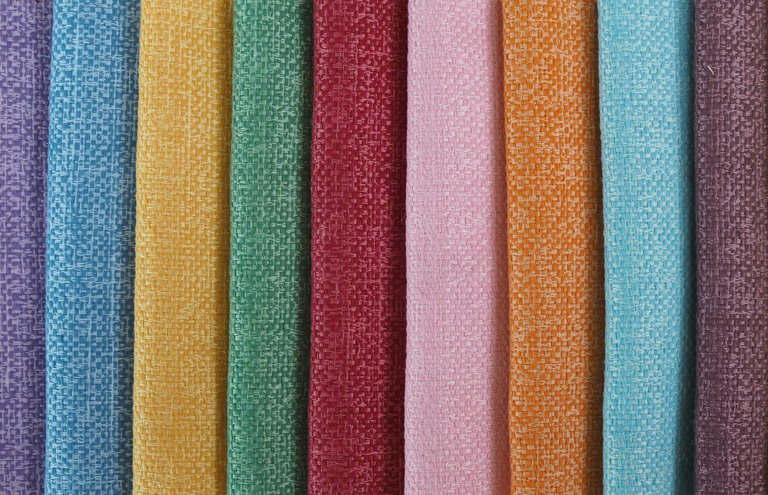 Colorful background, A stack of colorful fabric. Full frame shot of muti colored fabric background photo