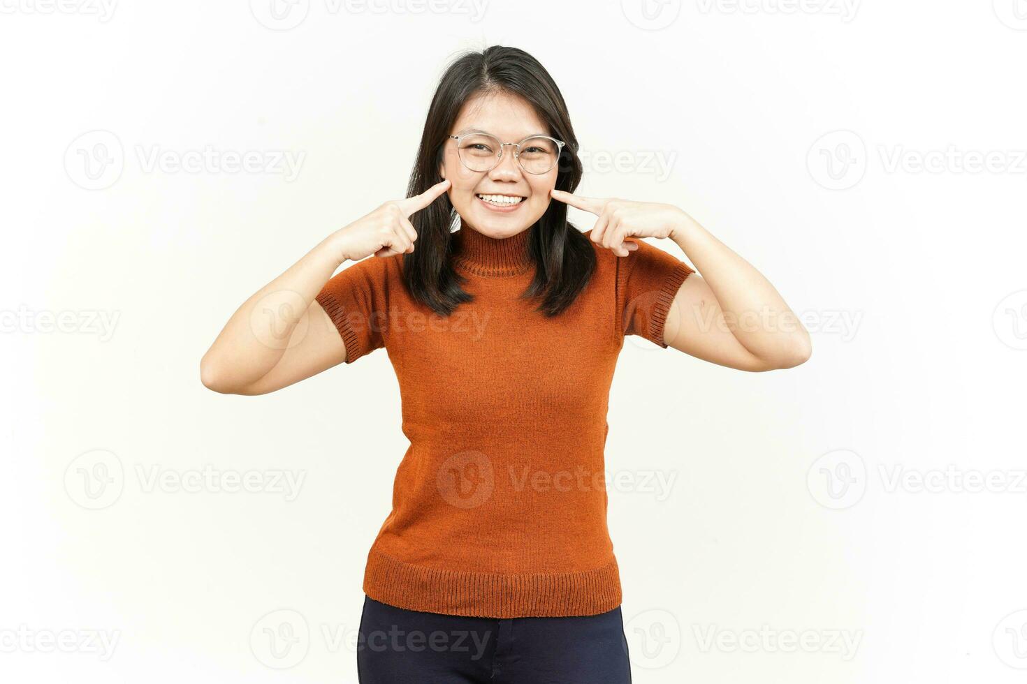 Smiling and Finger Touch Cheek Of Beautiful Asian Woman Isolated On White Background photo