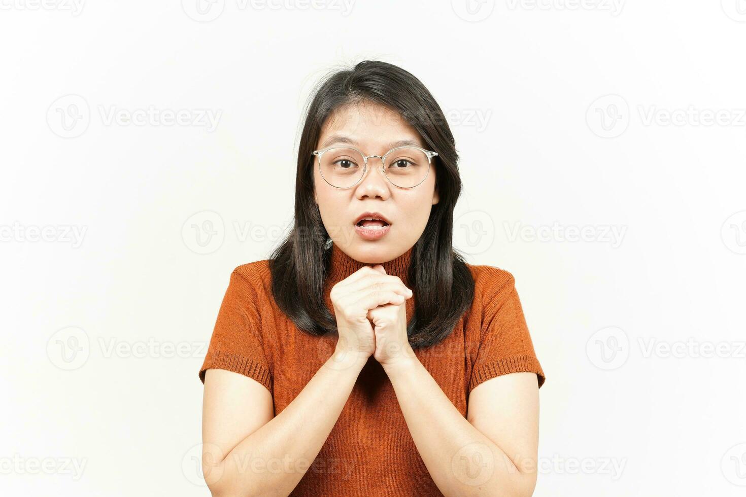 Begging Gesture Of Beautiful Asian Woman Isolated On White Background photo