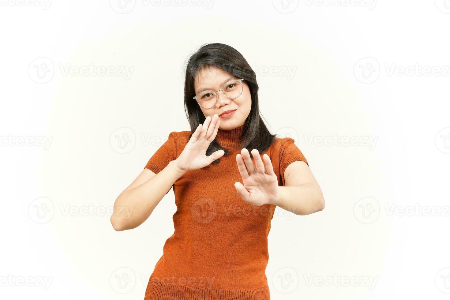 Stop and Rejection Hand Gesture Of Beautiful Asian Woman Isolated On White Background photo