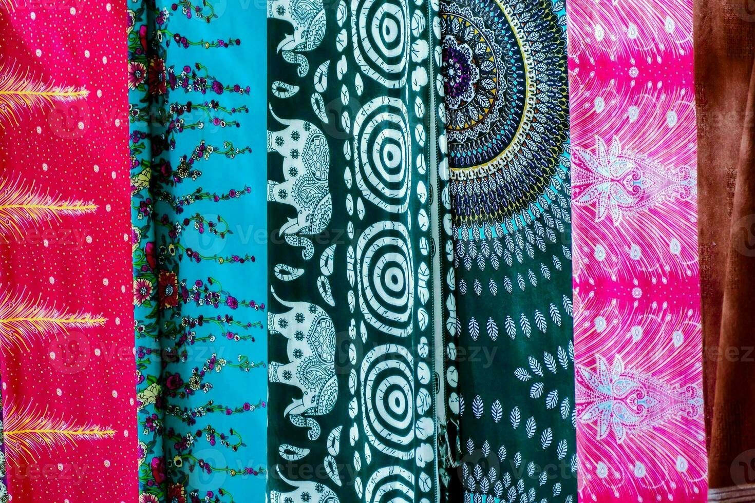 colorful fabric at a market stall photo