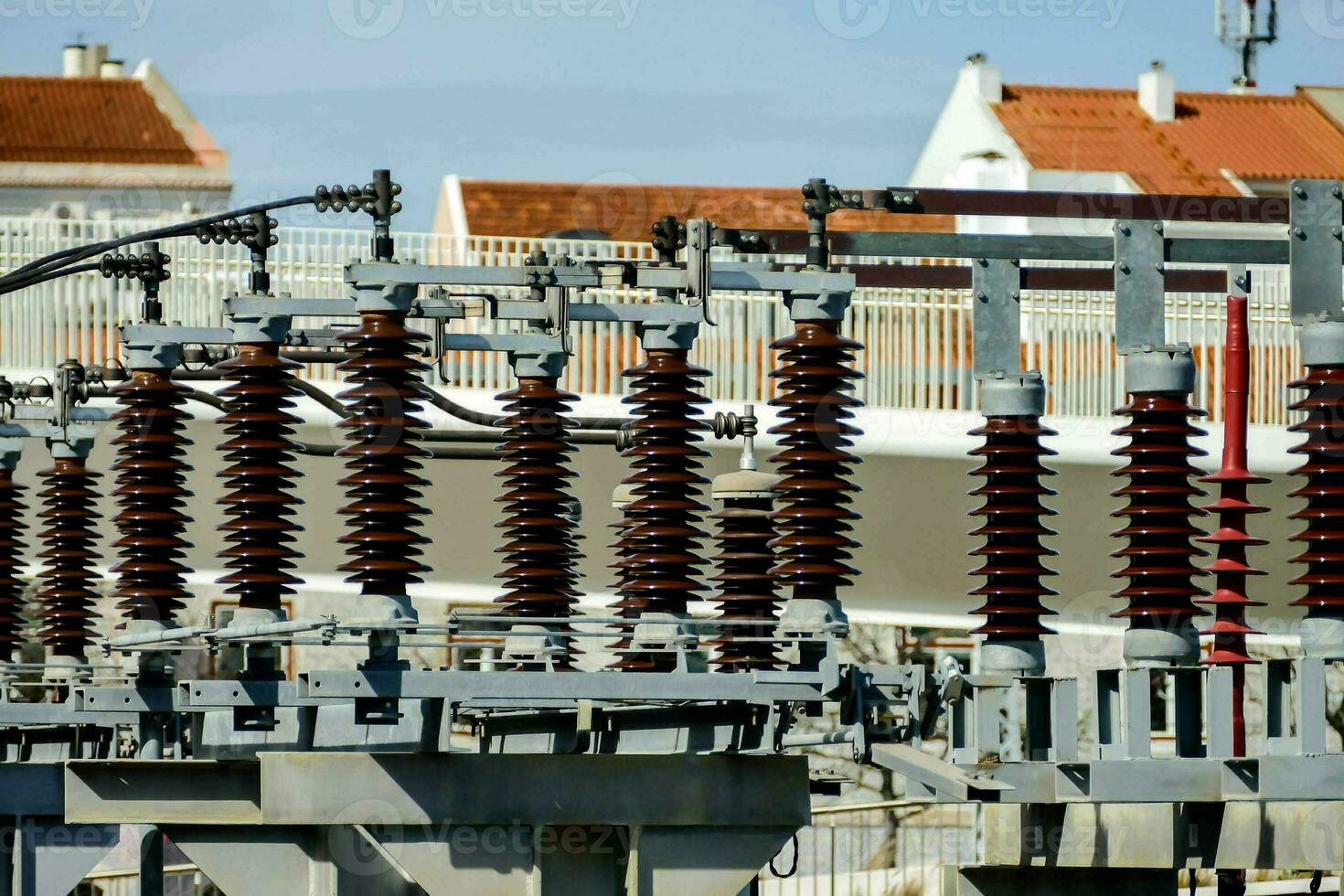 a group of electrical substations with wires photo