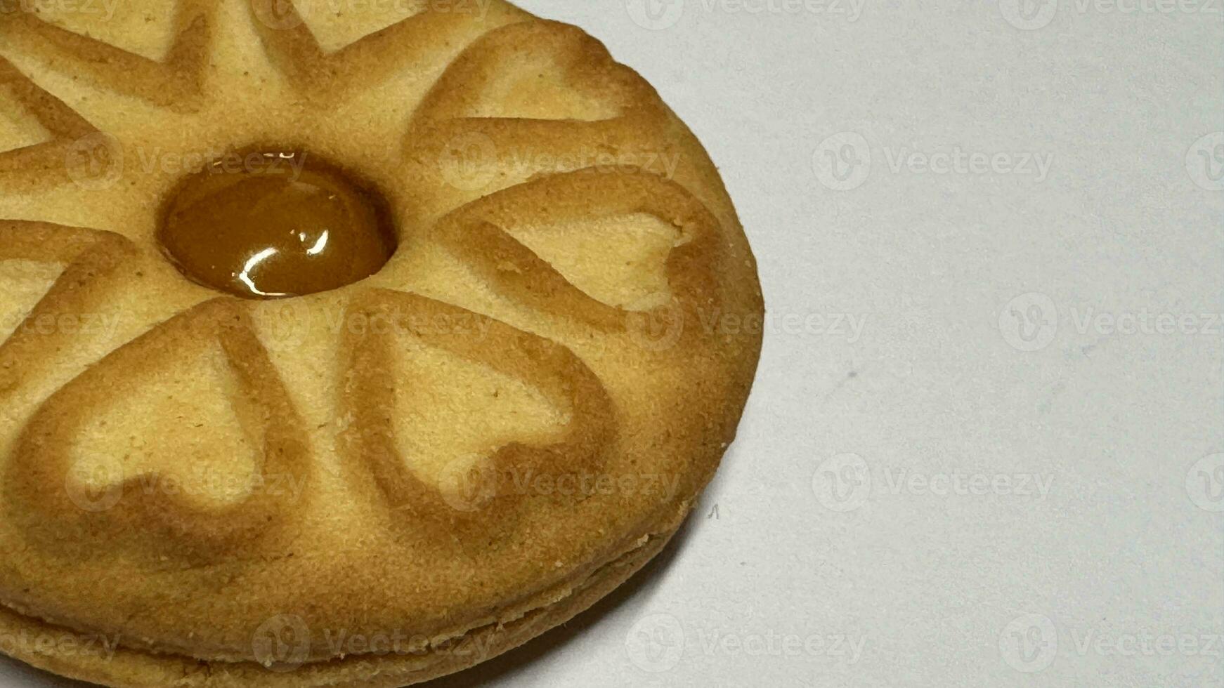Pineapple jam biscuits, cookie neatly arranged and photographed on a plain white background photo
