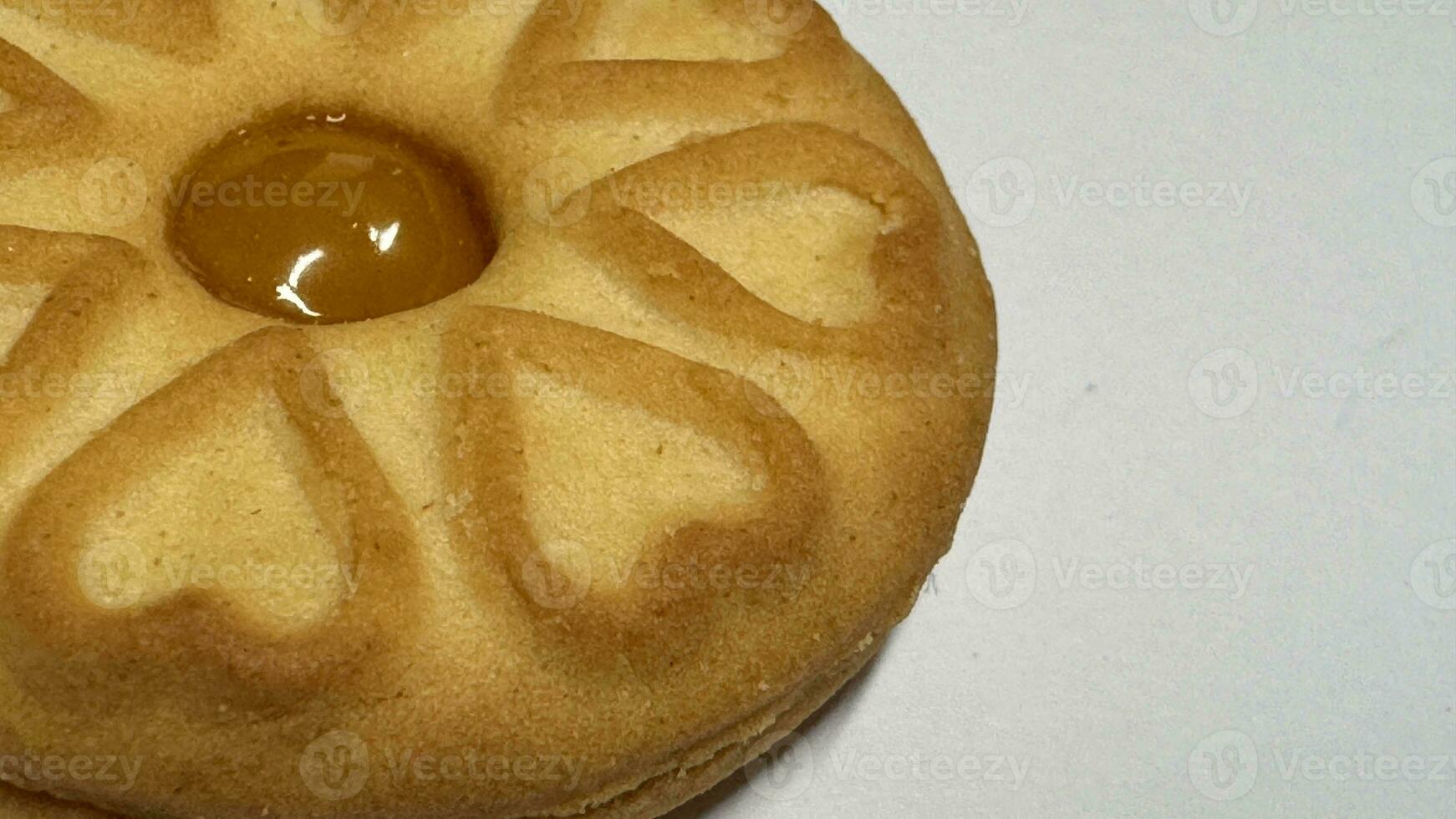Pineapple jam biscuits, cookie neatly arranged and photographed on a plain white background photo