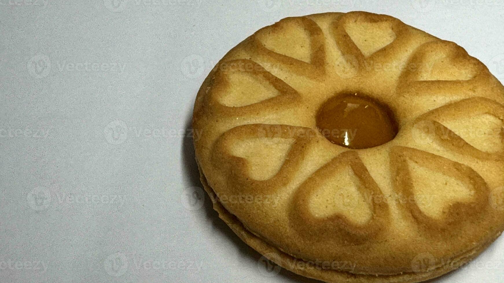 Pineapple jam biscuits, cookie neatly arranged and photographed on a plain white background photo