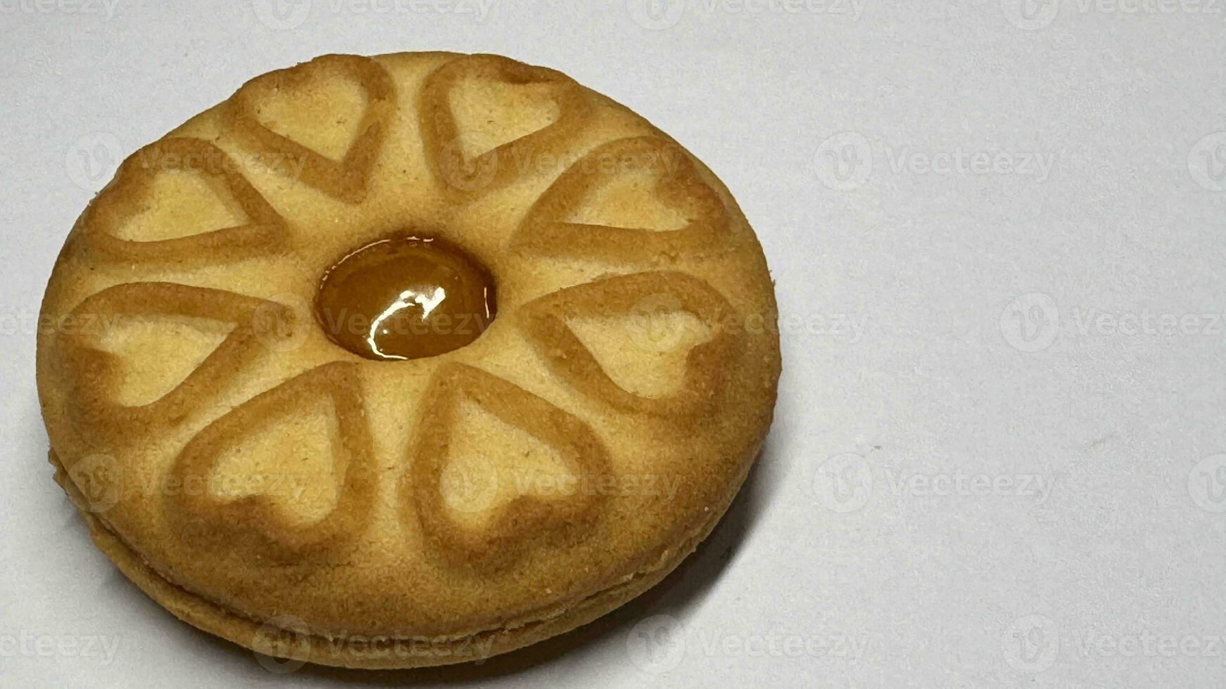 Pineapple jam biscuits, cookie neatly arranged and photographed on a plain white background photo