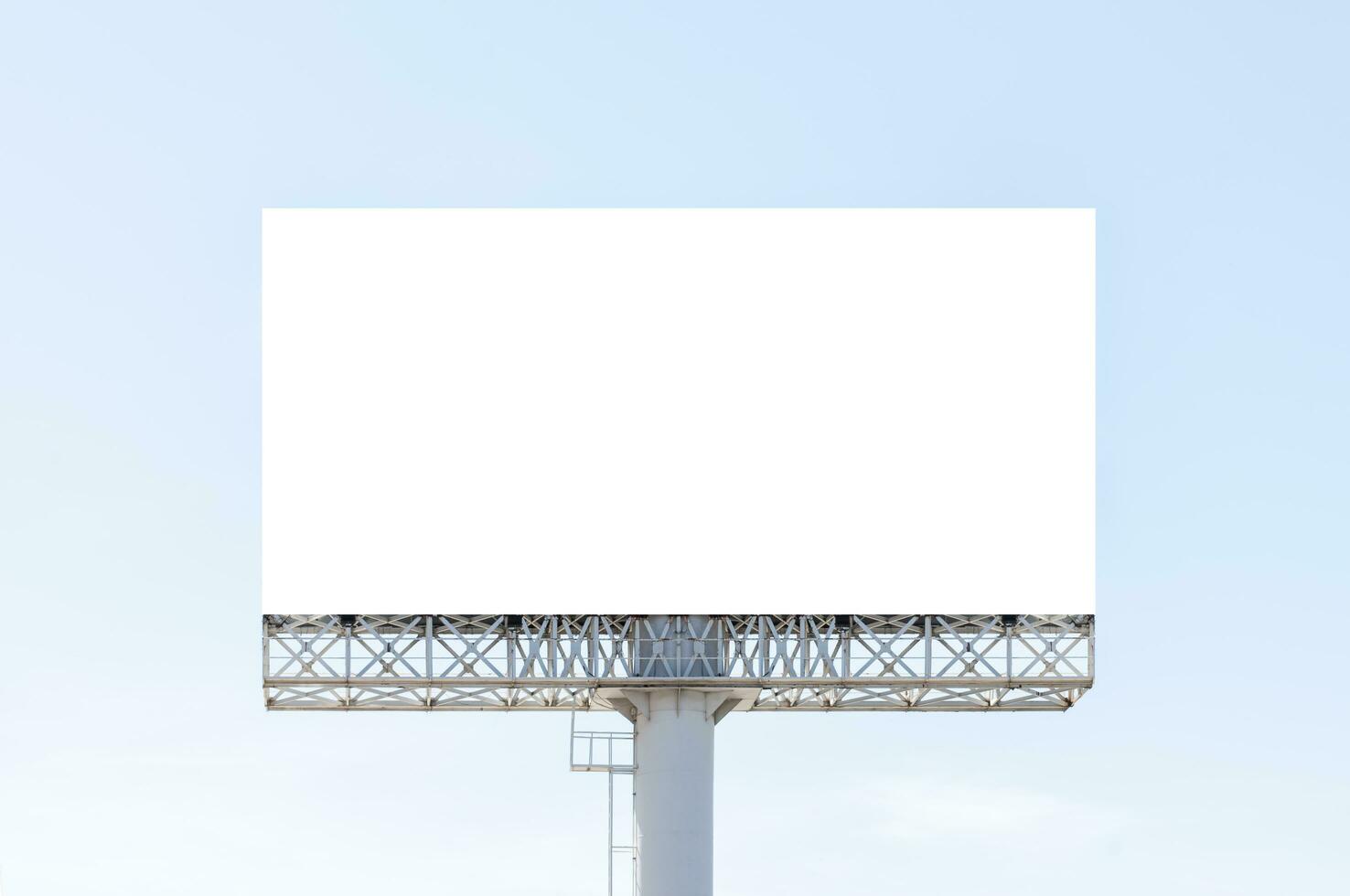 Pole outdoor billboard with blue sky background. Clipping path for mockup white screen photo