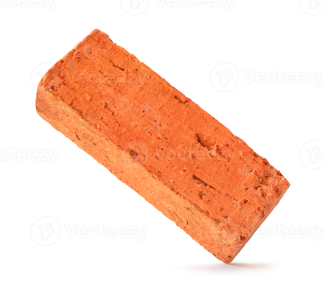 Single cracked old red or orange brick isolated with clipping path and shadow in png file format