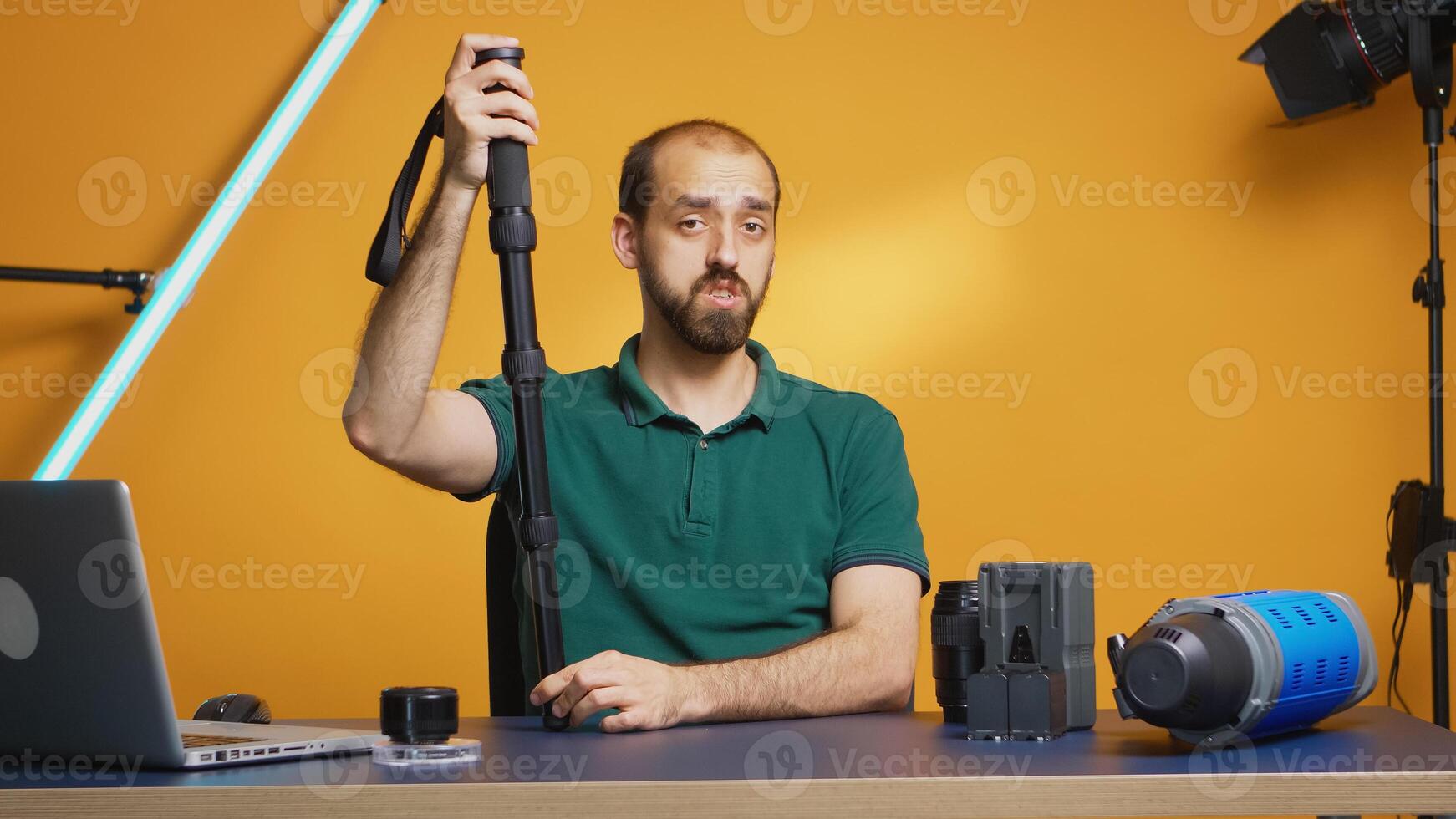 Content creator recording testimonial about monopod for vlog and subscribers. Professional studio video and photo equipment technology for work, photo studio social media star and influencer