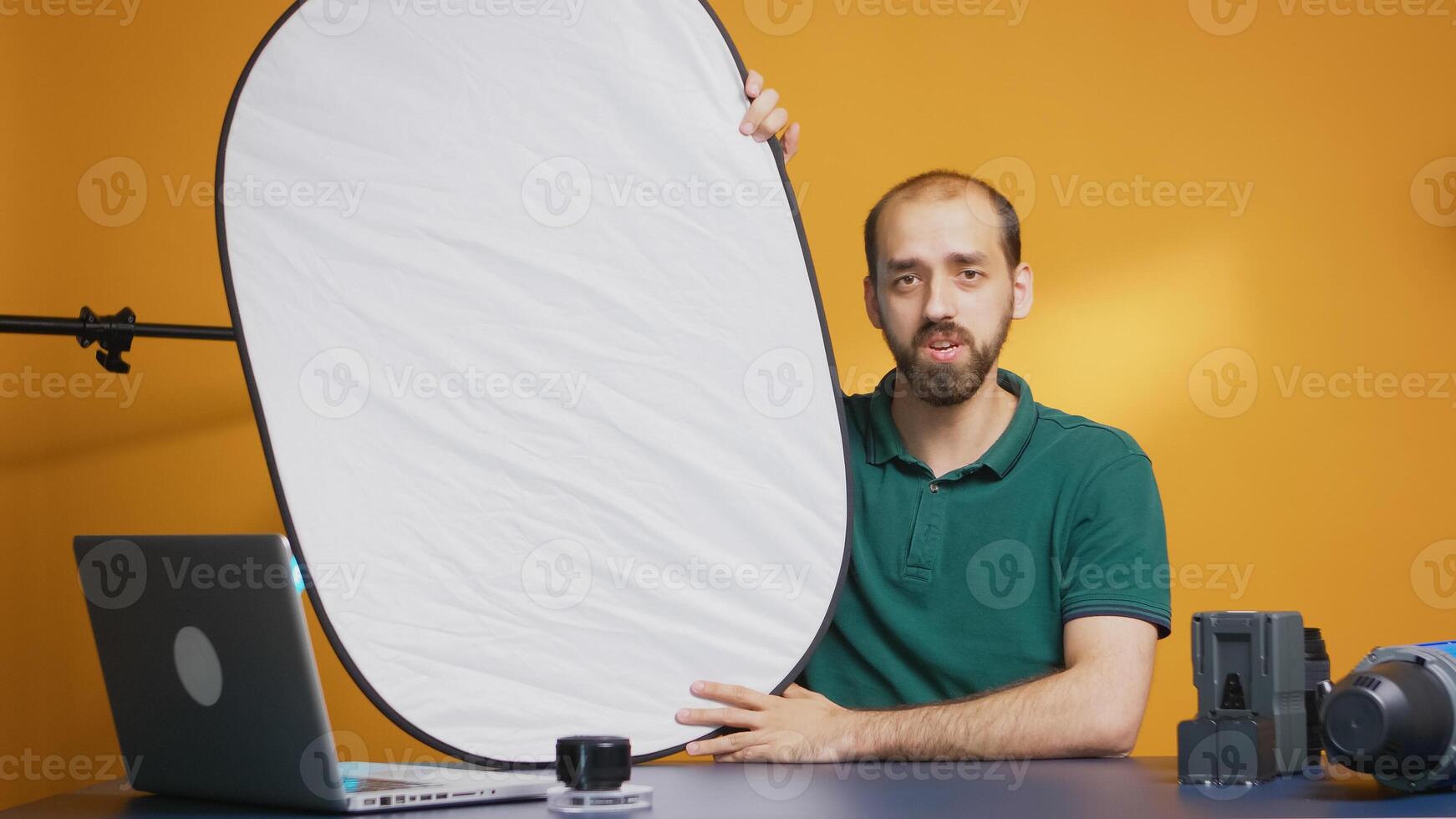 Photographer recording discussing about white light reflector for vlog. Professional studio video and photo equipment technology for work, photo studio social media star and influencer