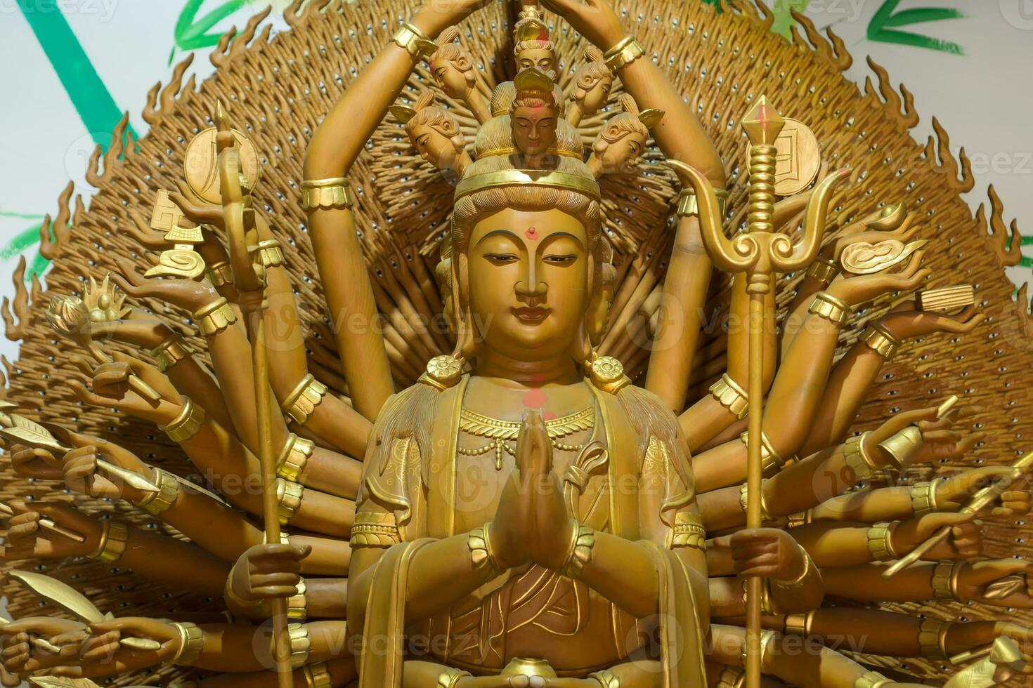 Close-up statue of Guan Yin, the Chinese goddess. photo